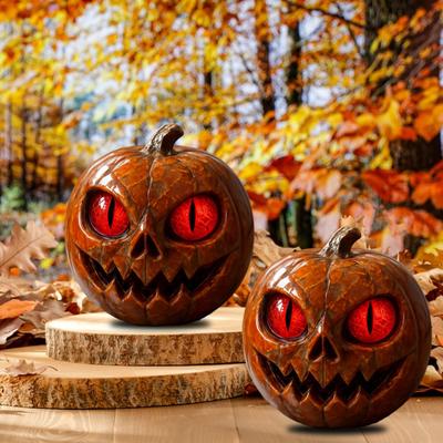 Ručně vyráběná figurka dýně s červenýma očima, pryskyřičná soška, strašidelná atmosféra, halloweenská ozdoba, dýňová dekorace s hororovou tématikou