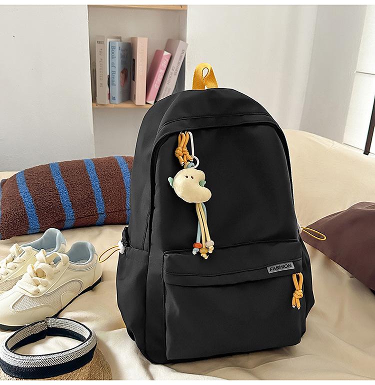 Schoolbag Korean version ins Solid color simple schoolbag Lazy wind backpack Female junior and high school students lightweight large-capacity 
