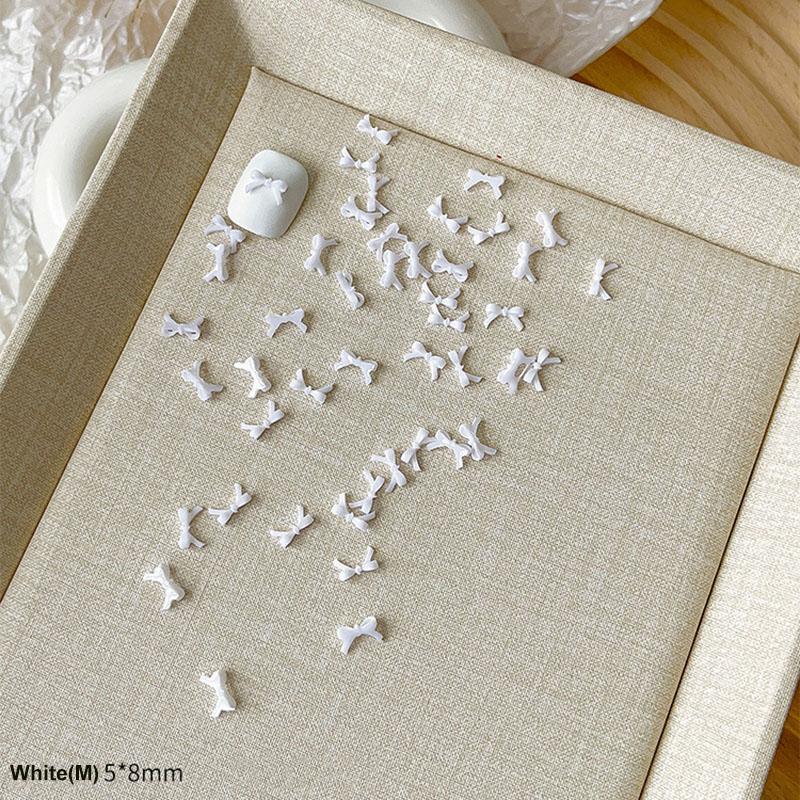 50Pcs Colorful Bow Nail Art Parts Charms Bulk Shiny Mini Resin Ribbon Nail Rhinestones Diy Summer Nail Art Decor Accessories