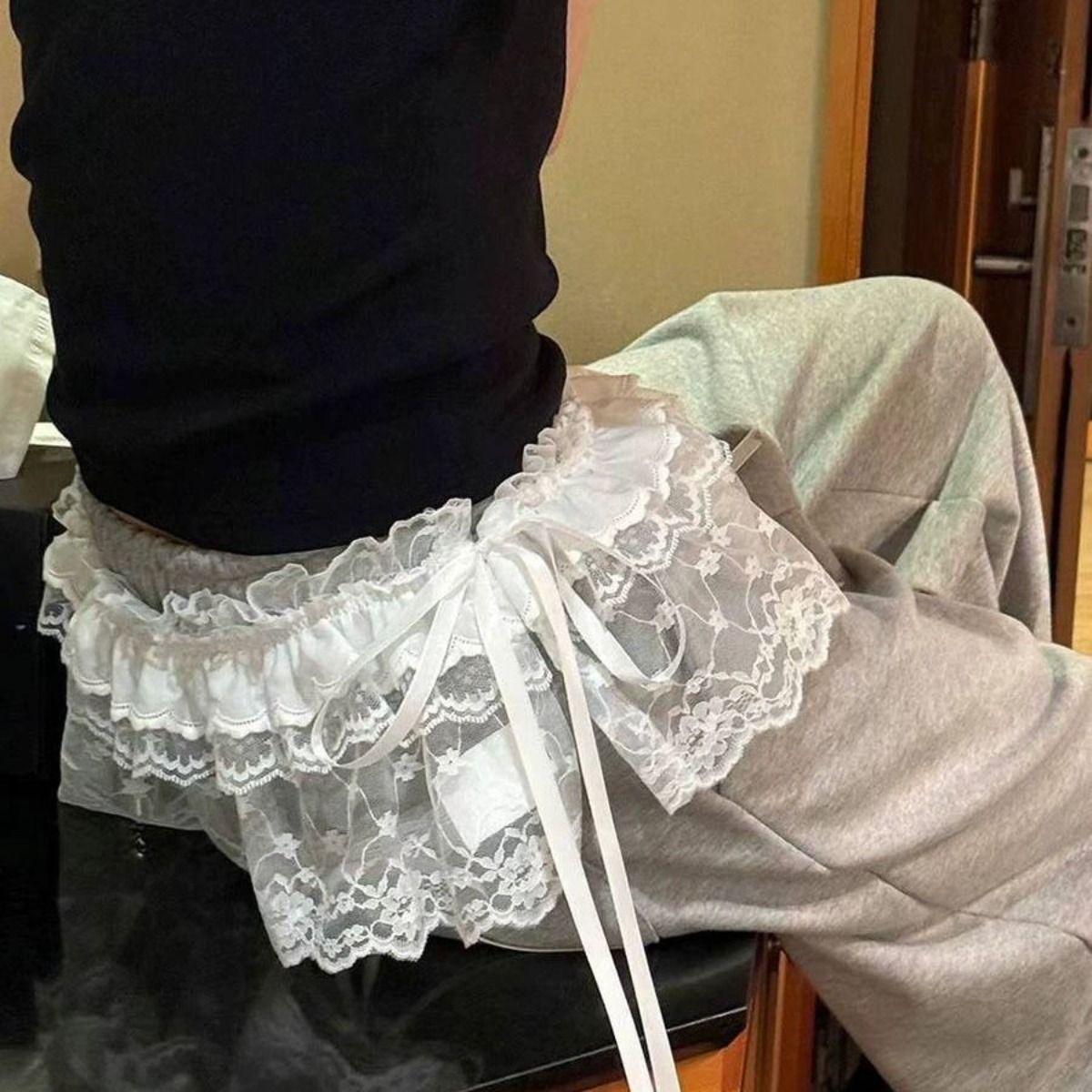 

Модная кружевная юбка-фартук с несколькими завязками и подолом в виде полушторы One Size чёрный