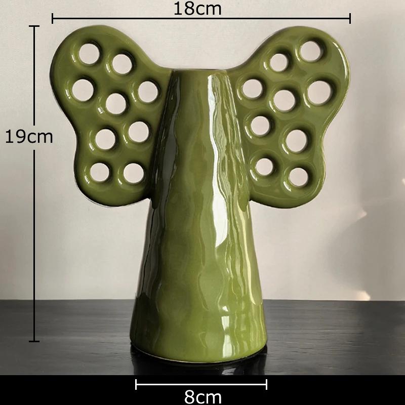 

Абстрактная керамическая ваза в форме слона Искусственный цветок Декоративные цветочные горшки Настольное украшение Цветочная композиция Домашние вазы зелёный