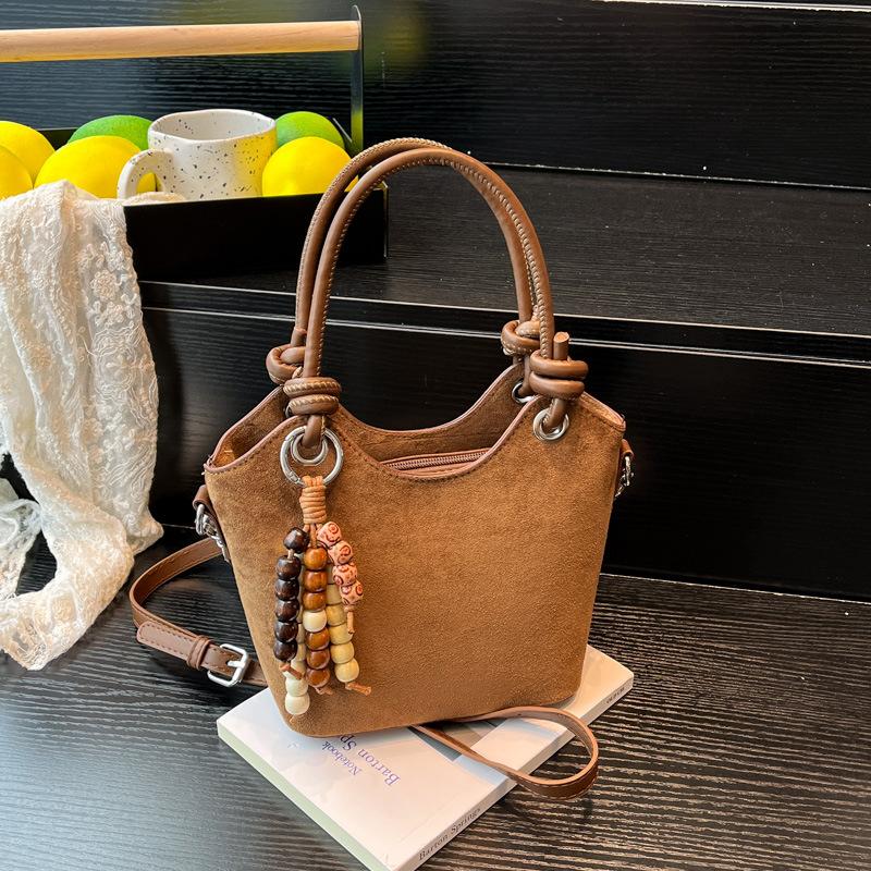 

Handbag women s ins trendy fashion oblique bucket bag new simple high-value shoulder women s bag bag коричневый