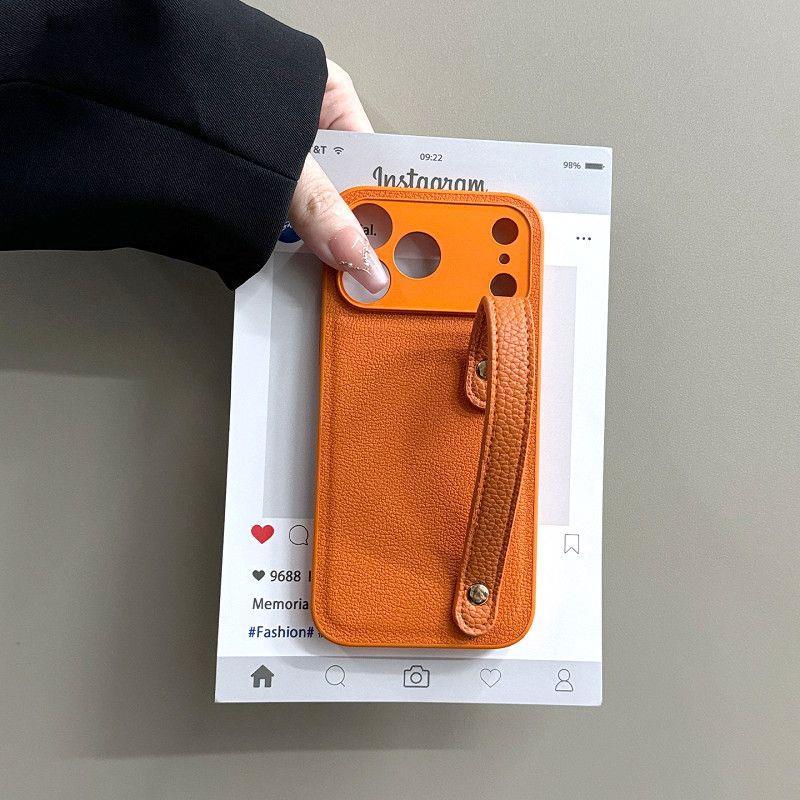 Niche Ins Xingyu Orange Leather Wristband Apple 17promax Mobile Phone Case IPhone16/13 Anti-drop 15