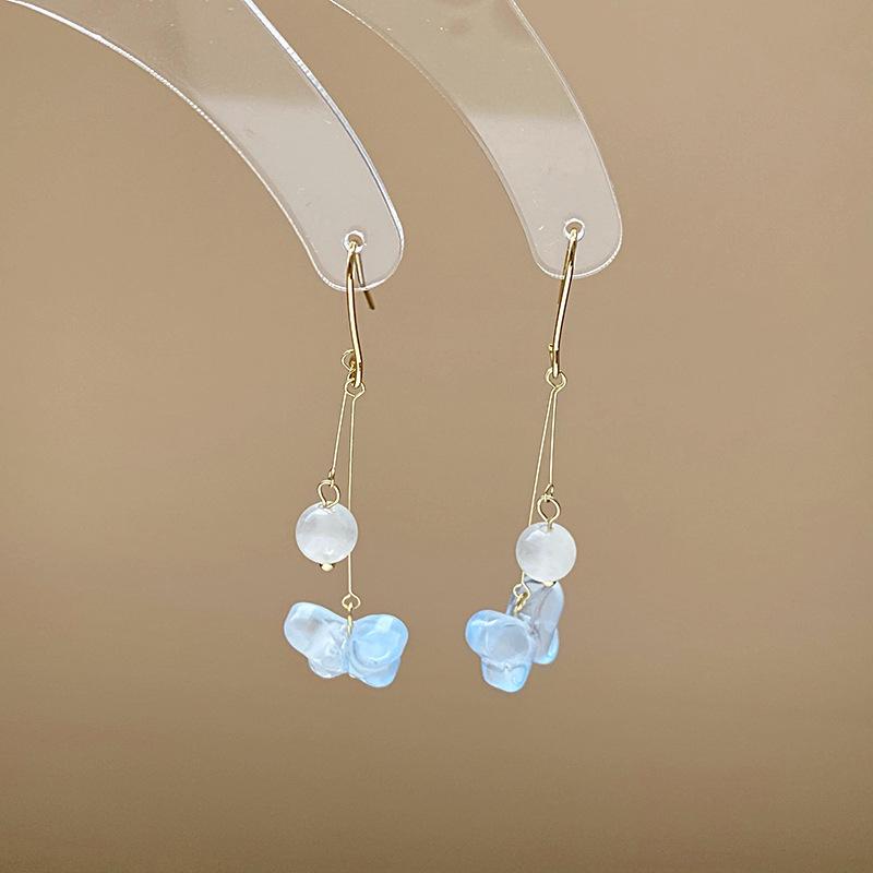 Vintage Quastenohrringe aus Silbernadel: Elegantes Wassertropfendesign mit einem Retro-literarischen Touch