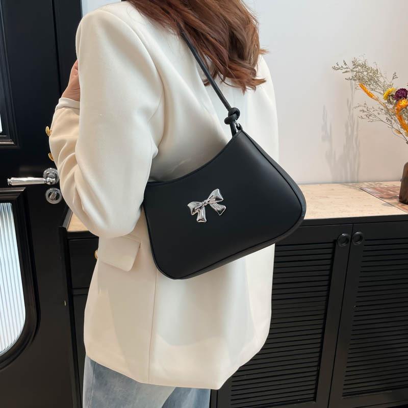Herbst neue Nische Schultertasche süße und frische Schleife Achseltasche Pendler-Temperament Handtasche