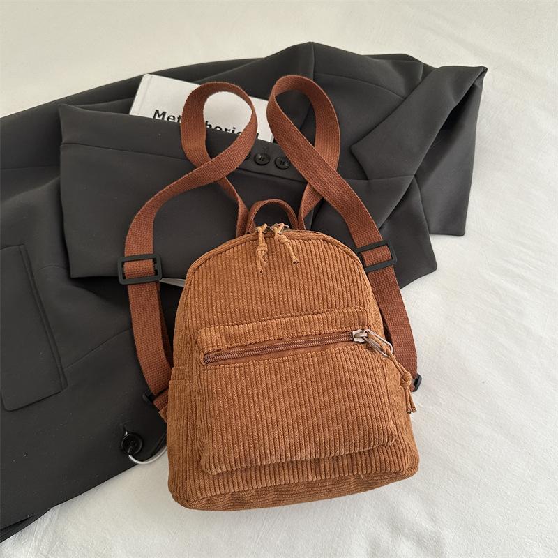 

2025 ретро вельветовый рюкзак для девочек с несколькими карманами для отдыха и путешествий, однотонный простой школьный рюкзак коричневый