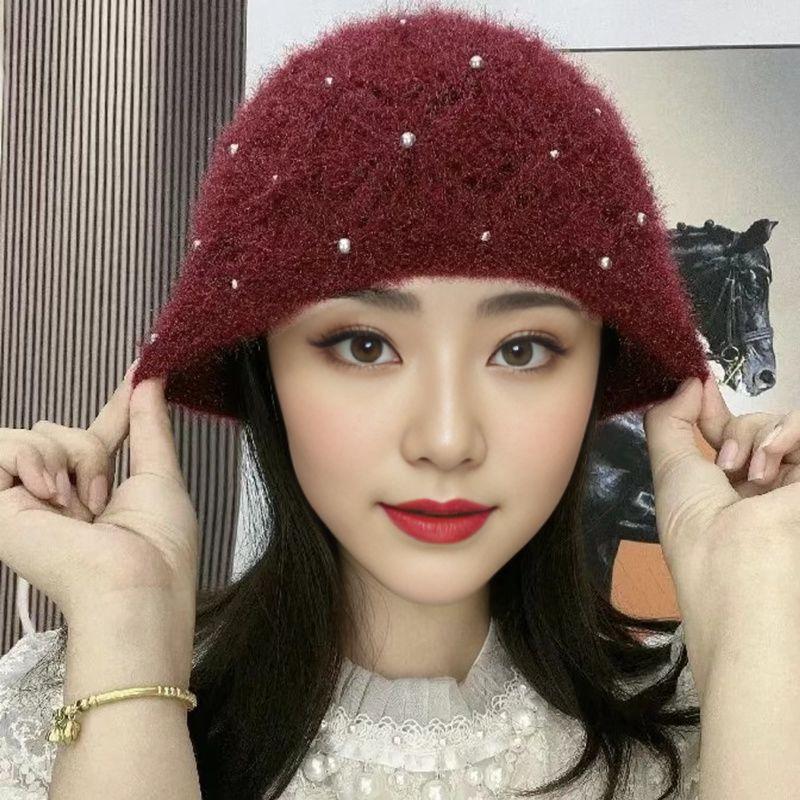 Korean version of fashion pearl headgear ear protection knitted heap hat winter handmade thickened warm mother wool hat women