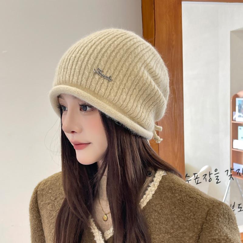 

Autumn and winter warm ear protection knitted hat children s versatile fashion pullover cold hat showing a small face cold-proof bag head stacking hat