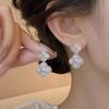 Pink four-leaf clover flash diamond stud earrings, pink shells burst, exquisite flower earrings, elegant earrings with temperament