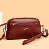 Hand-held small shell bag trendy girl portable hand-held change bag double-layer leather single shoulder oblique span women's bag