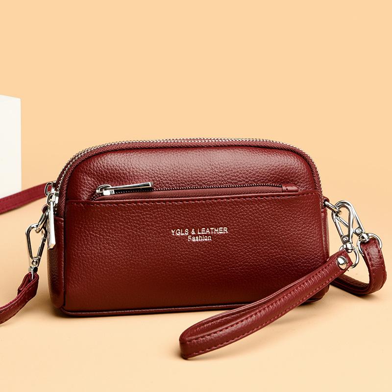Hand-held small shell bag trendy girl portable hand-held change bag double-layer leather single shoulder oblique span women's bag