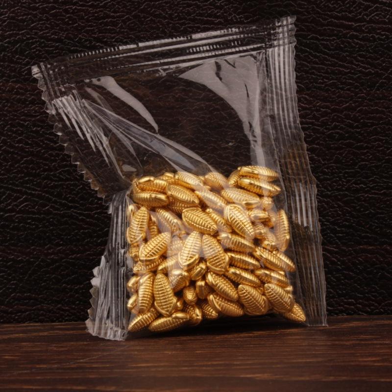 100Pcs Plastic Gold Attract Wealth Luck Charms Mini Dollars Ingots Gold Melon Seeds Handicraft