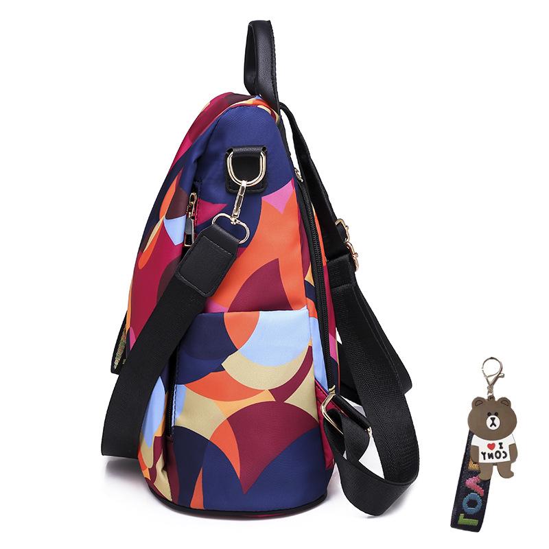 2024 Women's Korean Style Fashion Backpack: Versatile Oxford Cloth Anti-theft Design with Pendant