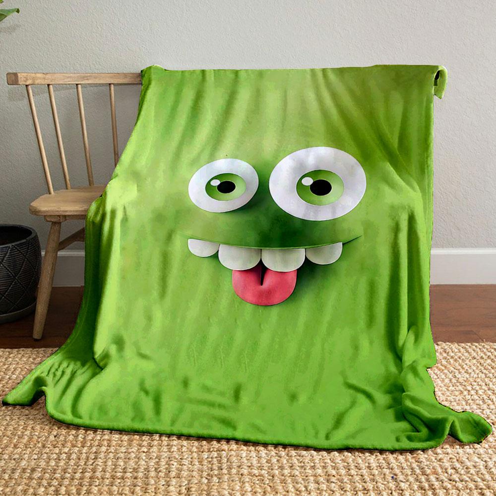A Playful Green Cartoon Face with Big Eyes, Teeth, and a Sticking-out Tongue. for All Seasons Blanket Lunch Break Throw Gift