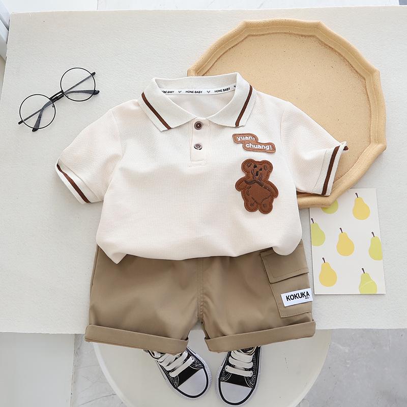 

Комплект летнего поло и шорт с мультяшным принтом для мальчиков 2023 - корейский стиль 80cm