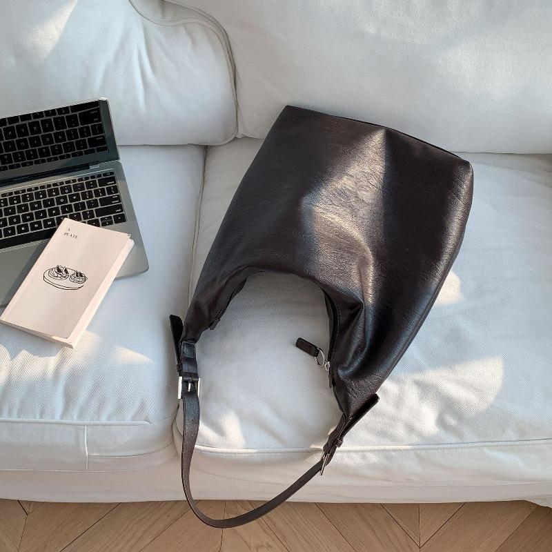 

Niche soft pitot bag large capacity women versatile work commuter bag simple shoulder bag women темно-коричневого