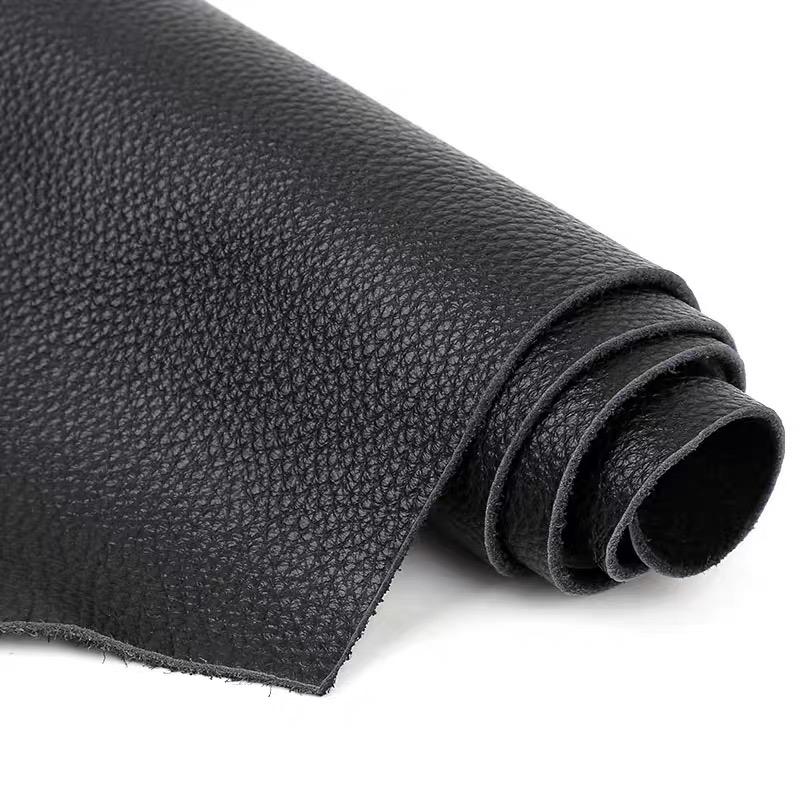 Black cowhide leather lychee pattern soft bag sofa head layer cowhide fabric leather fabric whole piece leather fabric