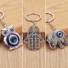 Bonne Chance Nazar Oeil Bleu Porte-clés Argenté Vintage Hibou Éléphant Main de Fatima Pendentif Porte-clés Talisman Bijoux Cadeau Pour Hommes Femmes