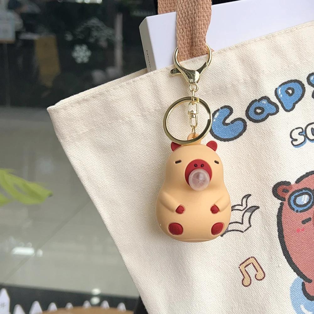 Kapibara Ściśnij Zabawka Muzyczna Nadmuchująca Bańki Breloczek Lalka Kapibara dla Dziewczynek Zabawki Anty-stresowe Zawieszka do Plecaka Dziecięcego