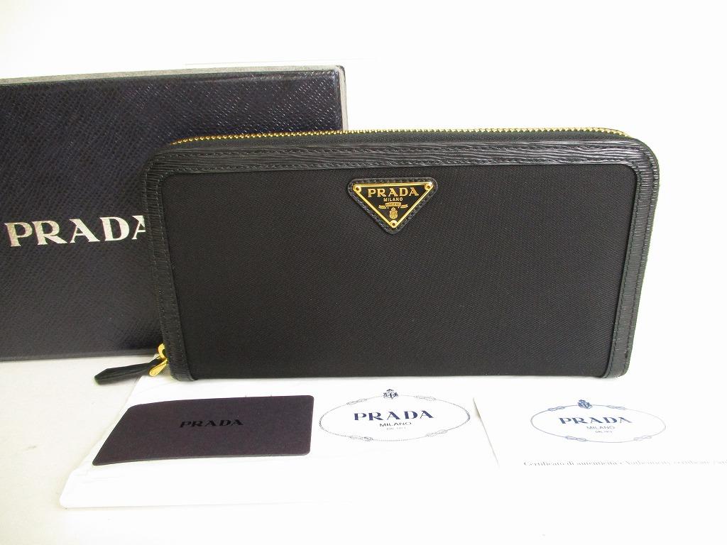 

Автентичний довгий гаманець PRADA із чорної нейлонової шкіри H/W на круглій блискавці №9000 відремонтований