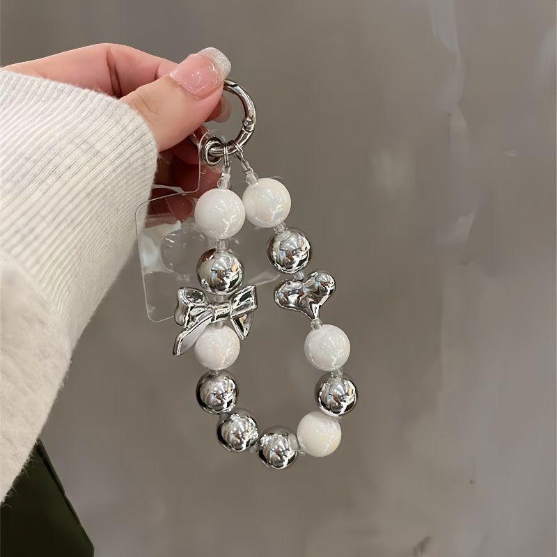 Premium mobile phone chain electroplated bow love beads ins style women s wrist lanyard short new