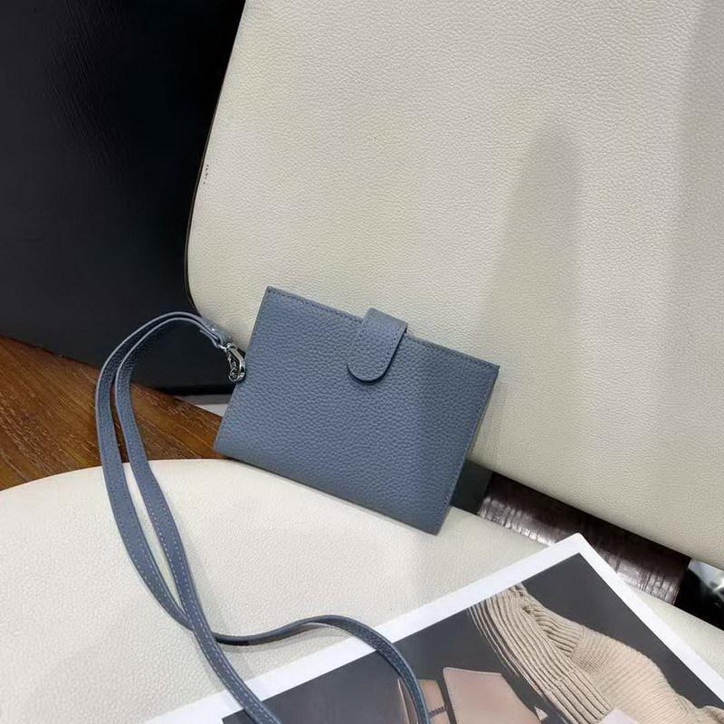2025 New Genuine Leather Wallet Head Layer Leather Double Fold Vertical Passport Bag Multi Card Anti Theft Hanging Neck Wallet Cross Border