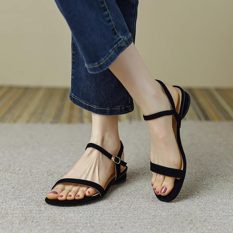 Leather Open-toed Sheepskin Sandals Women's New Simple and Versatile Flat-bottomed Fairy Style French Low-heeled One-word Button Roman Shoes