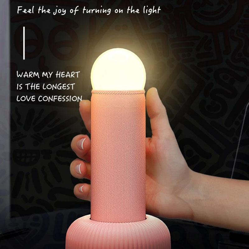 Interest Handheld Night Light Creative LED Sleeping Lamp Original Design Unique Switching Method Has A Base for Placing on Table