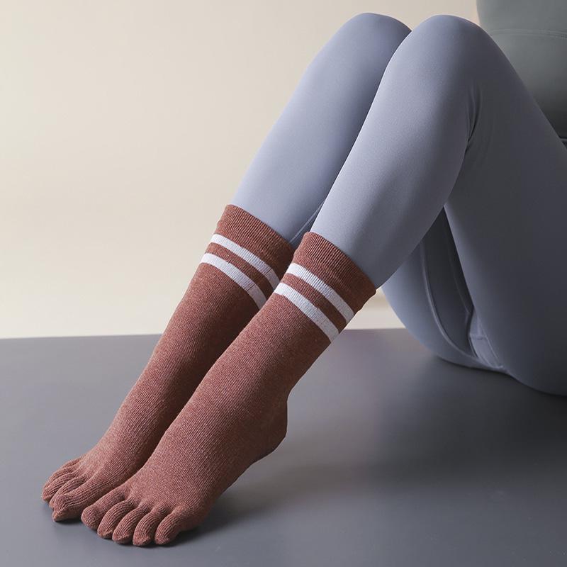 Women's Non-Slip Five-Finger Yoga Socks - Thick, Medium-Long Tube, Trendy Stripes, Sweat-Absorbent for Autumn & Winter.