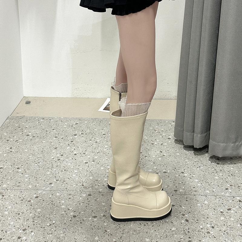 Fashion temperament niche design thick-soled heightening boots women's autumn and winter new simple and versatile high boots