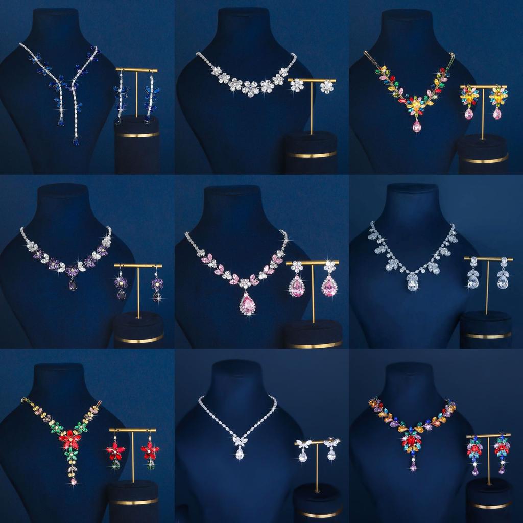 A Set of Classic Fashion Claw Chains Gold Plated Alloy Necklaces Tassels Earrings and Bracelets for Lady