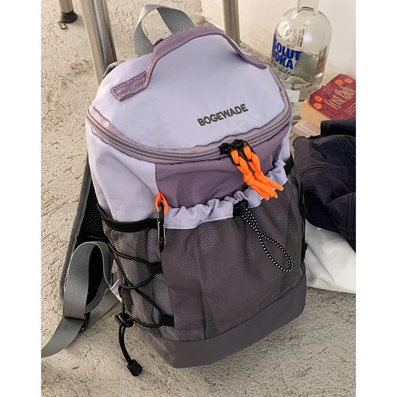 

Casual backpack large capacity lightweight backpack 2025 new contrasting color versatile outdoor hiking bag travel bag фиолетовый