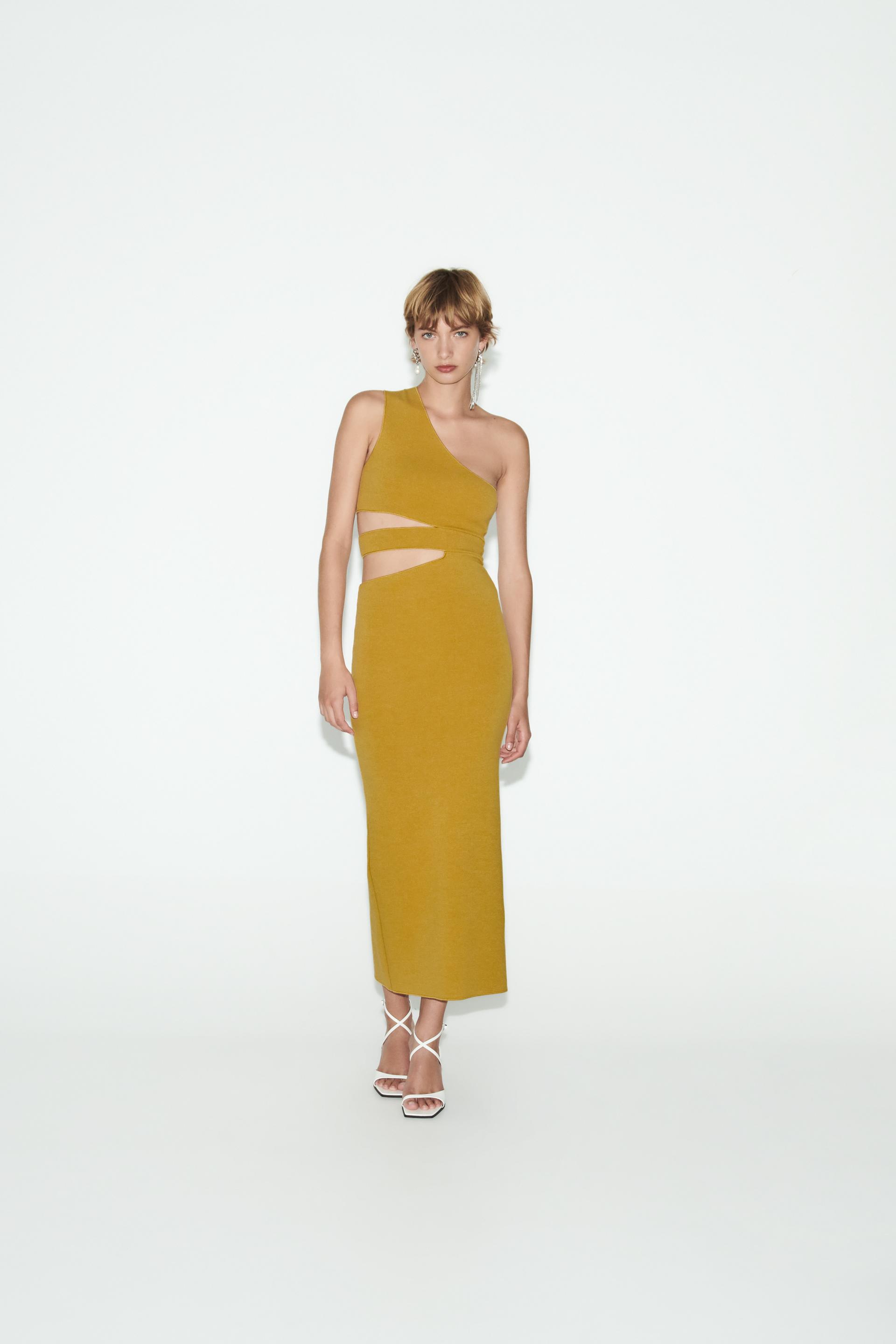 

FITTED KNIT MINI DRESS WITH CUT-OUT DETAIL