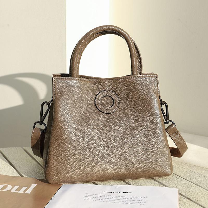 

Высококачественная сумка-ведро из натуральной коровьей кожи с узором личи, OEM, большая вместимость, портативная, мессенджер, женская сумка хаки