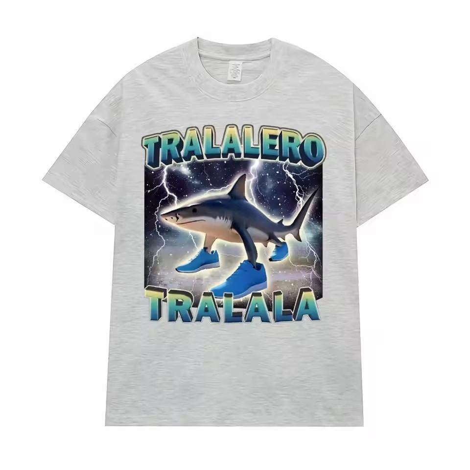 

Tralalero Tralala Смешная футболка с мемом «Акула» Подарки Унисекс Женская мода Готика Винтажные футболки Унисекс Повседневная юмористическая футболка Унисекс Топ 4XL