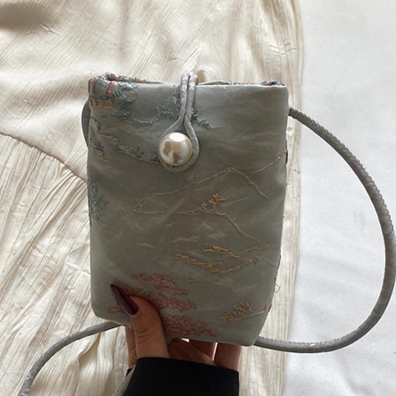 

New Chinese style national style bag women s 2025 new summer embroidered shoulder bag casual commuter tote bucket bag сірий колір