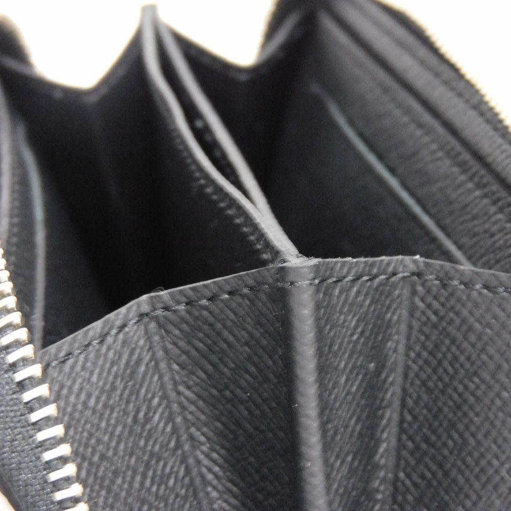 Used 12564 Zippy Coin Purse M30511 7943 New LV Logo Embossed Black Zip Around Taiga Noir Men's from Japan AUTHENTIC