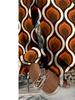 The new women's blouse features a printed V-neck long-sleeve design. It adopts Bohemian-style fringed sleeves and is perfect for spring.