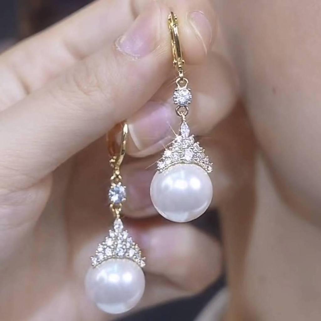 Elegante 2024 Perlenohrringe: Schickes, einfaches und stilvolles Design
