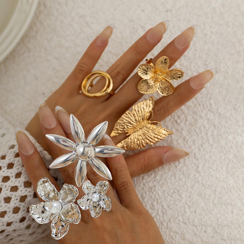 Exaggerated flower temperament imitation pearl finger ring, personalized butterfly metal texture jewelry for women