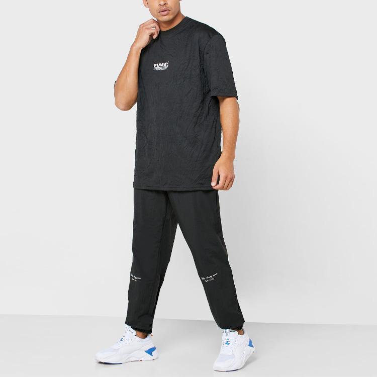 Puma X Randomevent Spodnie dresowe tkane co-branded Męskie Spodnie Czarne 59666601