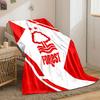 A red tree and wave logo with two stars, framed by geometric red shapes. for all seasons blanket lunch break throw gift