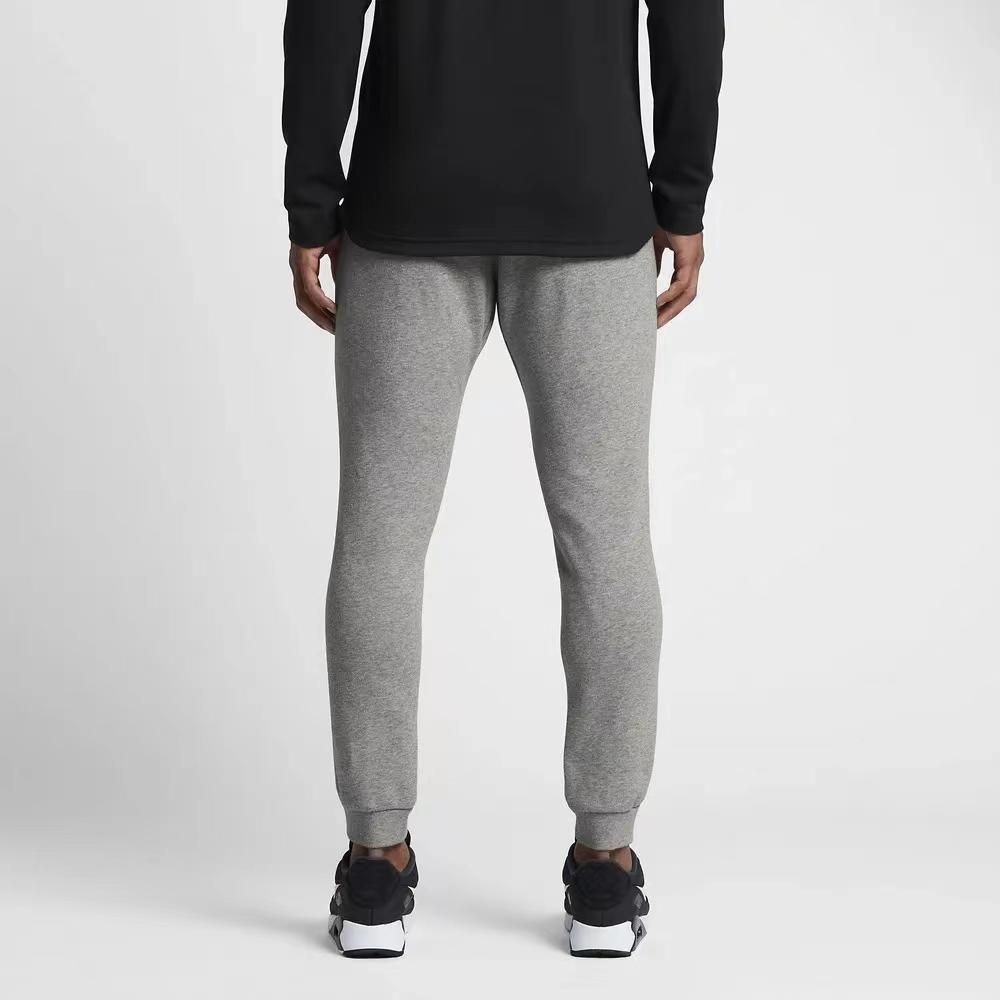 Nike Joggeri casual din tricot cu logo-ul de culoare uni Pantaloni pentru bărbați Gri 804409-063