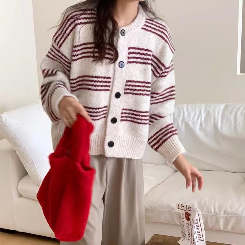 Autumn and winter new versatile striped contrasting color knitted cardigan top women's loose lazy wind outside sweater jacket
