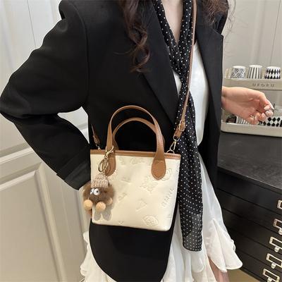 Sommer neue leichte Luxusästhetik Nischendesign hohe Textur tragbare Schulter Messenger Bag Bucket Bag