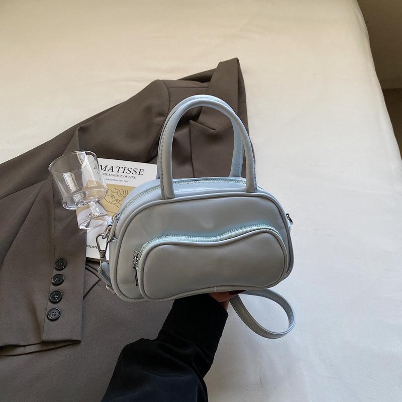 Small bag women's spring and summer versatile new fashion messenger bag high-end portable bowling bag