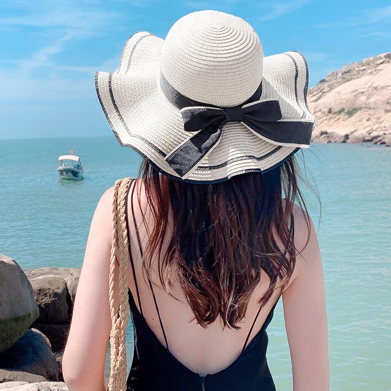 Straw hat women's small fresh and versatile pearl tether bow hat women's summer outing big eaves beach sun hat