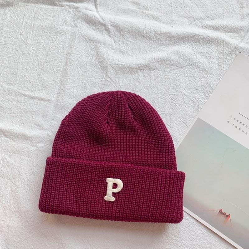 Hat winter female high-value round face student versatile cold-proof warm face small knitted wool hat