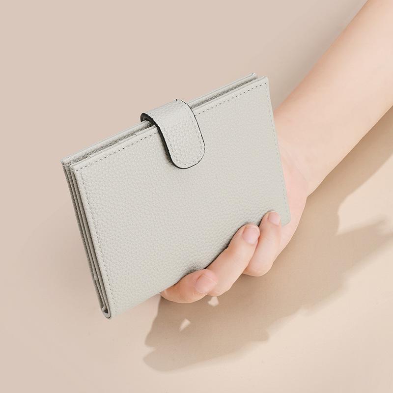 Neuer Stil pu RFID ultradünne Reisepasstasche multifunktionale Geldbörse Flugticketinhaber Reisepassdokument-Geldbörse Aufbewahrungstasche weiblich