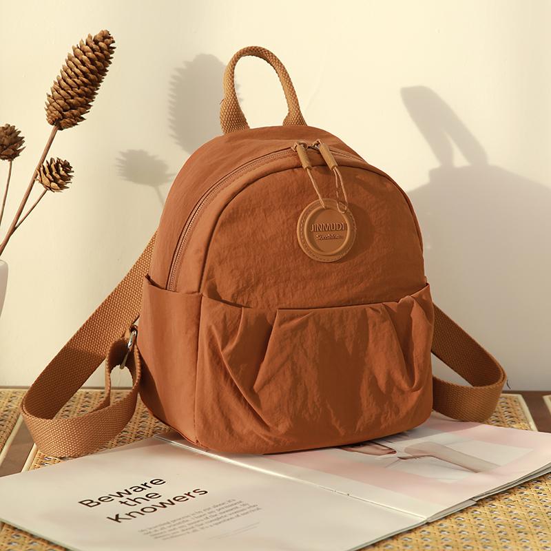 Leichte wasserdichte Nylon-Tasche gefalteter Pendler-Rucksack einfarbig Damen-Rucksack